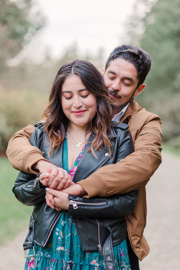 Man and woman during engagement session at UW Arboretum in Seattle WA